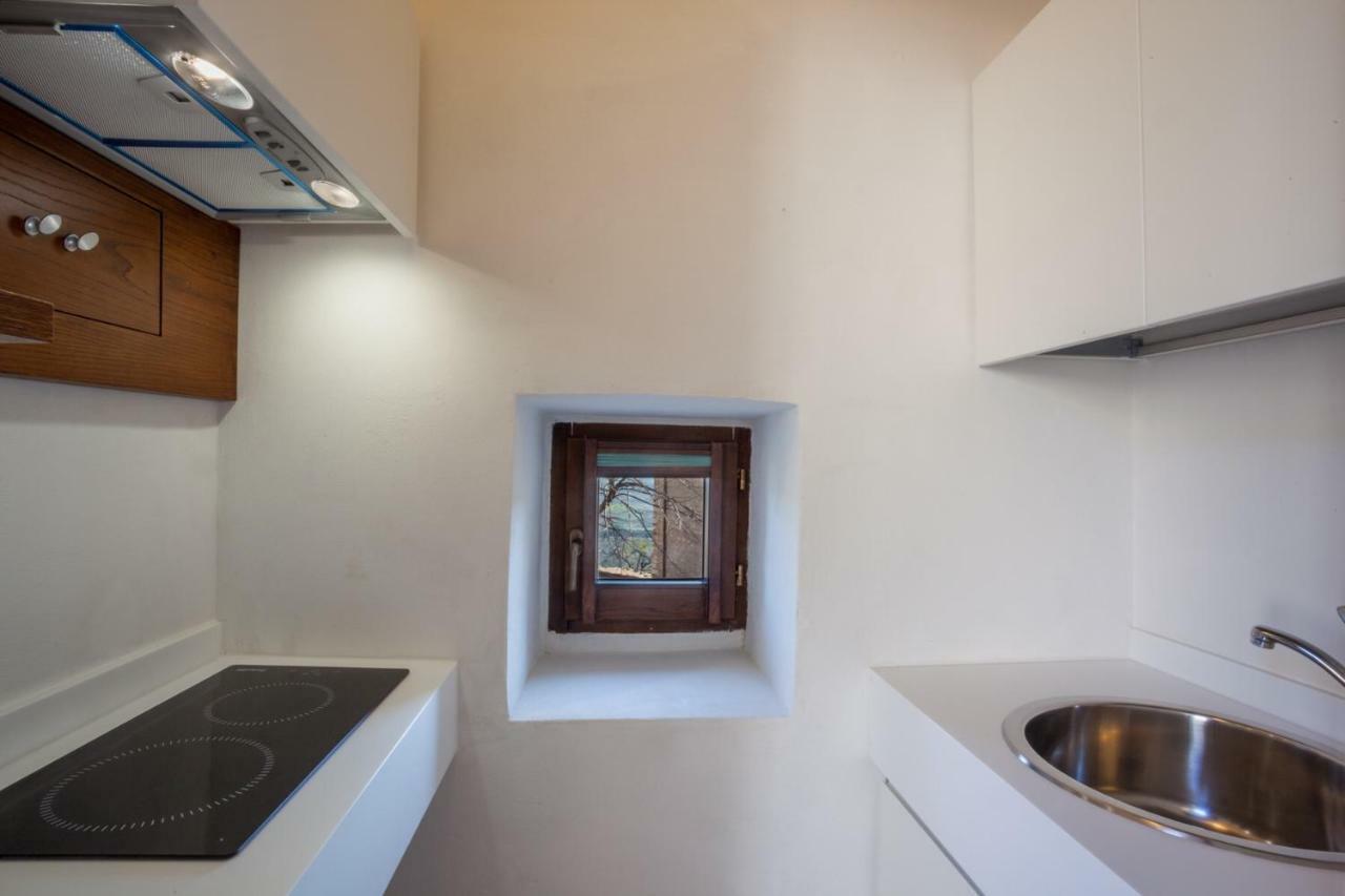 Il Castello Di Campello Aparthotel กัมเปลโล ซุล กลีตุนโน ภายนอก รูปภาพ
