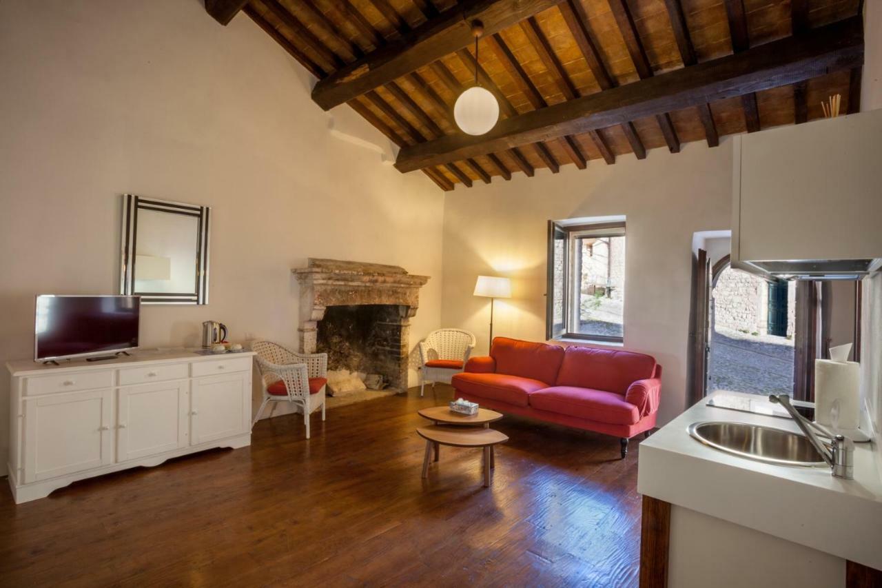 Il Castello Di Campello Aparthotel กัมเปลโล ซุล กลีตุนโน ภายนอก รูปภาพ