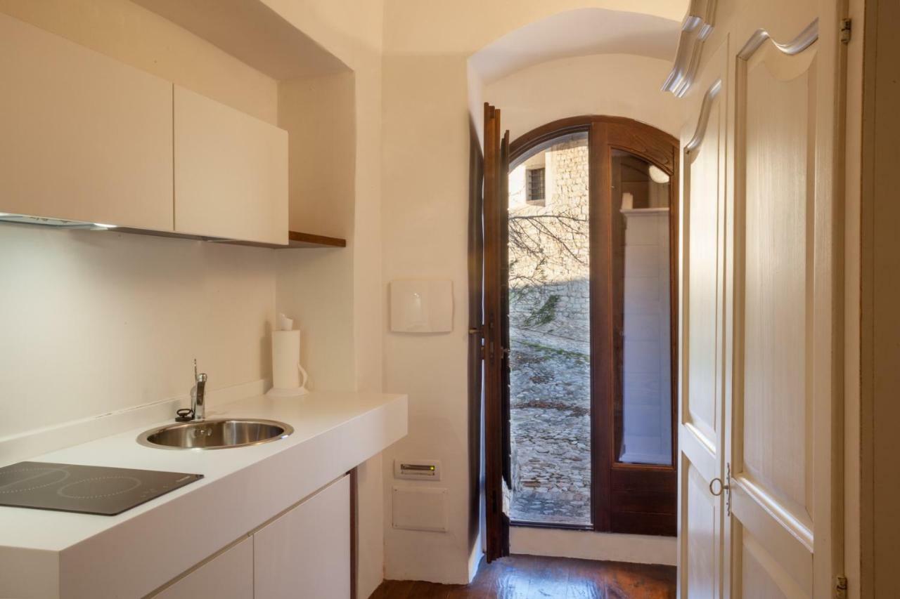 Il Castello Di Campello Aparthotel กัมเปลโล ซุล กลีตุนโน ภายนอก รูปภาพ